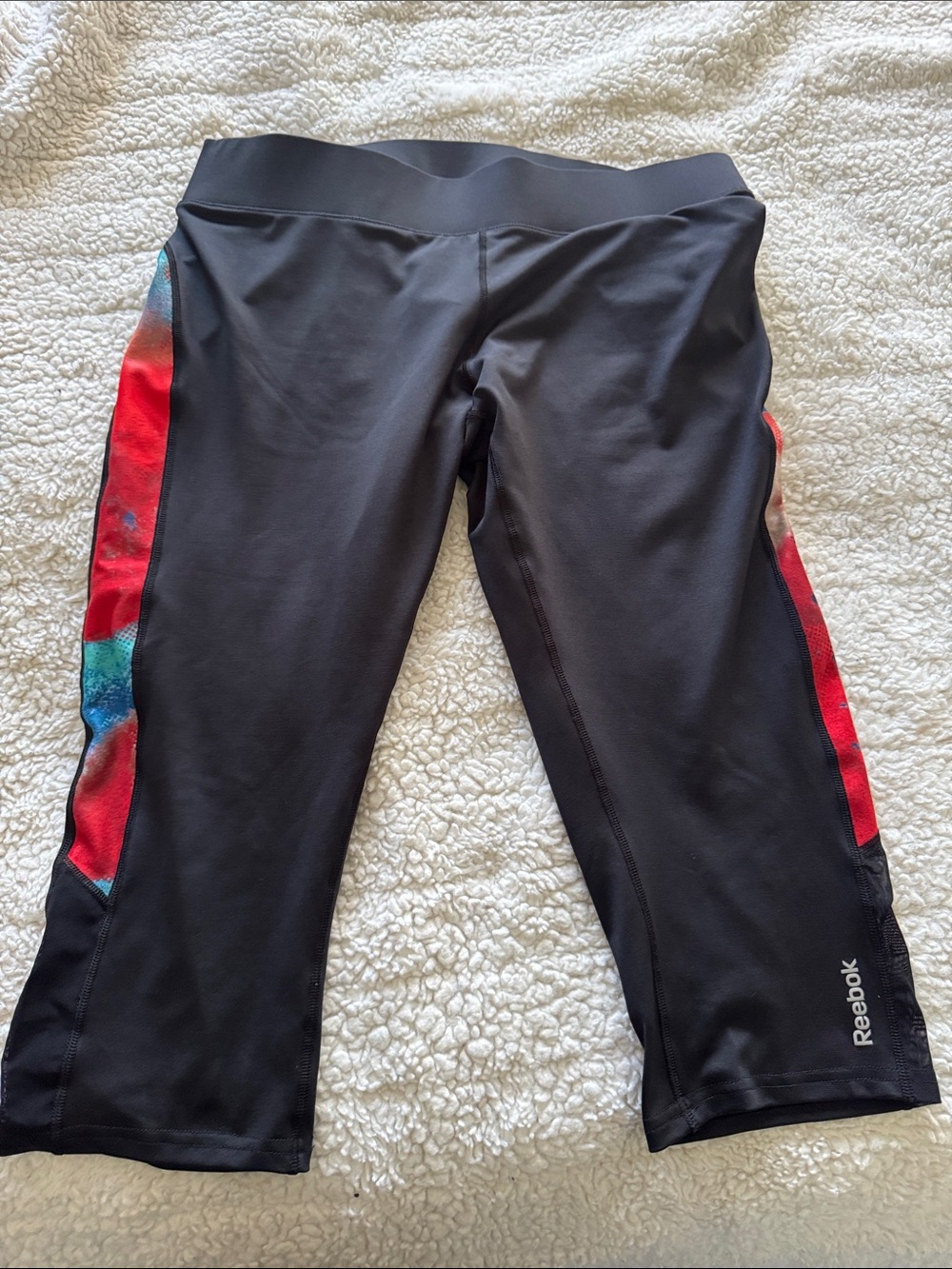 Reebok Black Capri Leggings with Red and Teal Side Panels